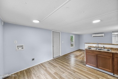 This 2-bedroom, 1-bath single-wide home offers a great - photo 3