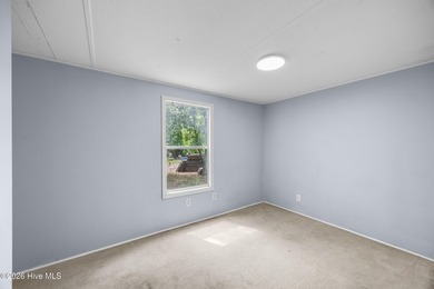 This 2-bedroom, 1-bath single-wide home offers a great - photo 9