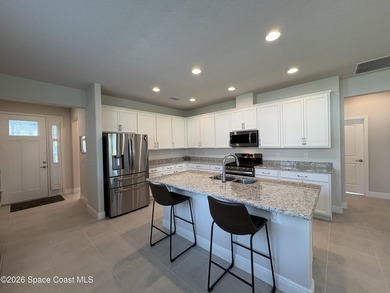 Beautifully maintained 2024 waterfront home in desirable Pangea - photo 10
