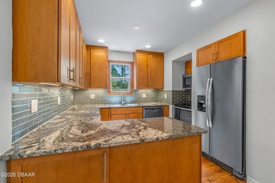 Modern updates make this beachside property completely move in - photo 16