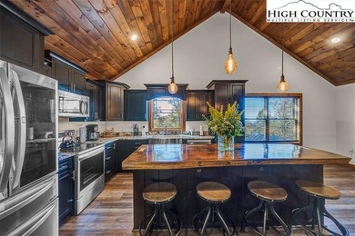 Nestled under the peaks of Sugar Mountain is this 3 bedroom, 3.5 - photo 22