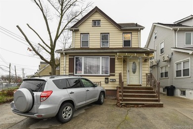 Well maintained two family in residential Rosedale. Both floors - photo 1