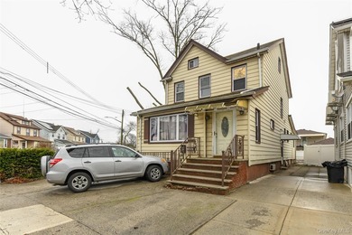 Well maintained two family in residential Rosedale. Both floors - photo 3