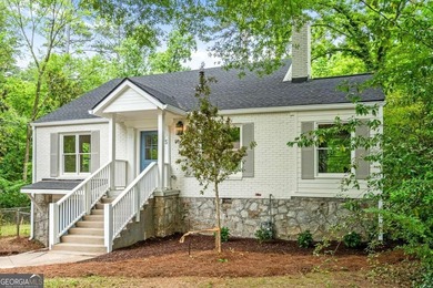 BACK ON MARKET! 65 Roseclair Drive sits close enough to the 2nd - photo 2