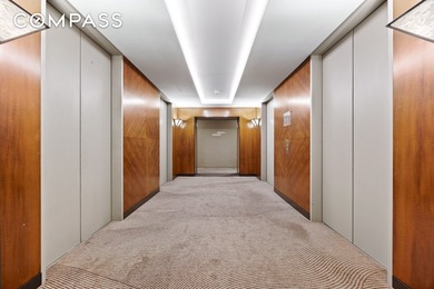 Perched on the 43rd floor of the iconic CitySpire tower, this - photo 3