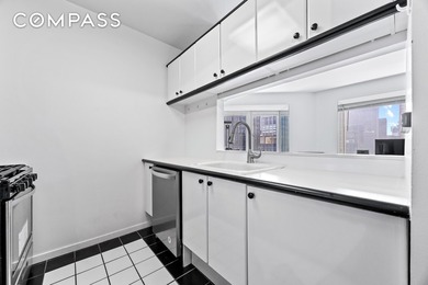 Perched on the 43rd floor of the iconic CitySpire tower, this - photo 9