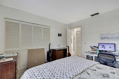 Beautifully maintained 2-bedroom, 2-bath villa featuring tile - photo 15