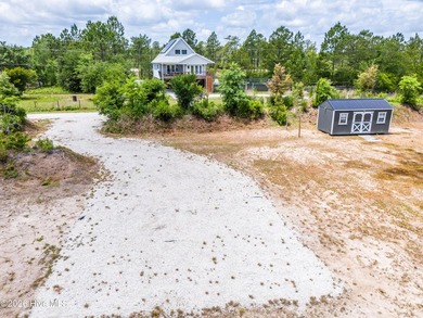 Nestled in the heart of coastal North Carolina, this rare nearly - photo 22