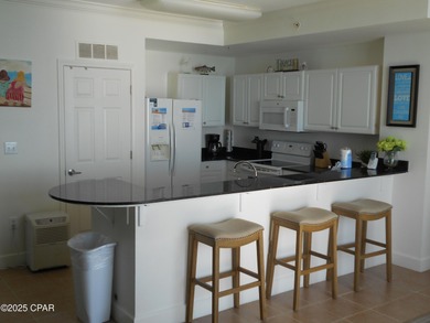 This 15th floor unit comes FULLY FURNISHED and is in pristine - photo 8