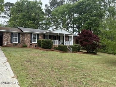 Welcome home to this beautiful 3-bedroom, 2-bath brick residence - photo 1