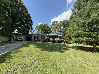 Welcome home to this beautiful 3-bedroom, 2-bath brick residence - photo 9