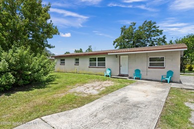 Welcome to this well-maintained concrete block 4 bedroom, 2-bath - photo 1