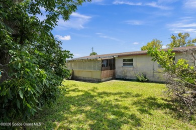 Welcome to this well-maintained concrete block 4 bedroom, 2-bath - photo 3