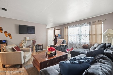 Welcome to this well-maintained concrete block 4 bedroom, 2-bath - photo 4