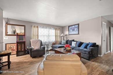 Welcome to this well-maintained concrete block 4 bedroom, 2-bath - photo 5