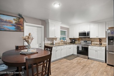 Welcome to this well-maintained concrete block 4 bedroom, 2-bath - photo 7