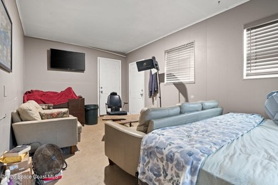 Welcome to this well-maintained concrete block 4 bedroom, 2-bath - photo 9