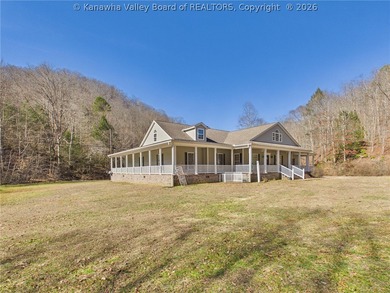 Set on 1.25 private acres, this 3,204-square-foot home offers - photo 2
