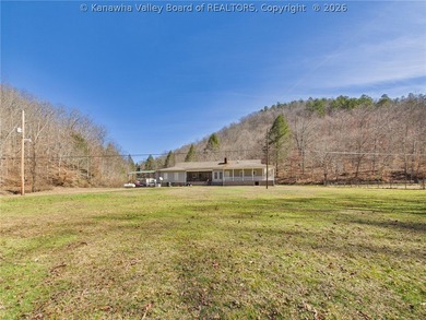 Set on 1.25 private acres, this 3,204-square-foot home offers - photo 5