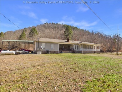 Set on 1.25 private acres, this 3,204-square-foot home offers - photo 6