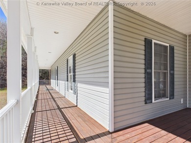 Set on 1.25 private acres, this 3,204-square-foot home offers - photo 9