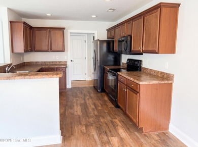 Step into a residence designed for everyday practicality at 1197 - photo 2