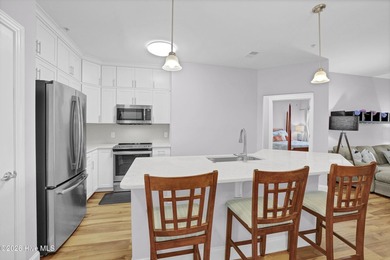 Coastal convenience meets low-maintenance living in this - photo 2