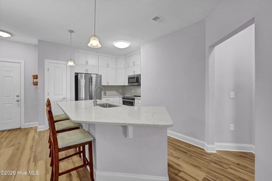 Coastal convenience meets low-maintenance living in this - photo 3