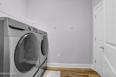 Coastal convenience meets low-maintenance living in this - photo 7