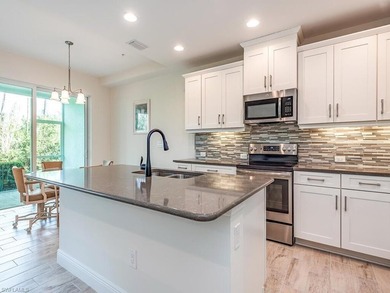 Nestled in a quiet alcove within the Avalon community, this - photo 5
