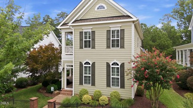 Welcome to this beautifully crafted home in the highly - photo 1