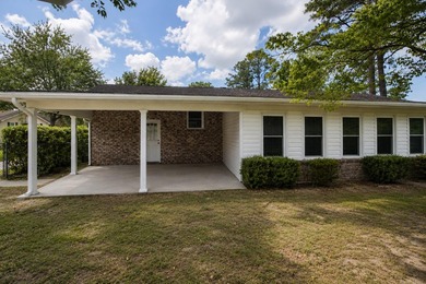 Situated on a spacious corner lot surrounded by mature trees - photo 22