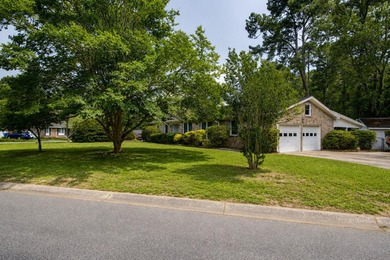 Situated on a spacious corner lot surrounded by mature trees - photo 35
