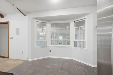 Situated on a spacious corner lot surrounded by mature trees - photo 48