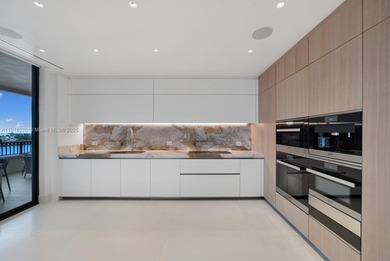 This elegantly designed 4-bedroom, 4.5-bath residence at Palazzo