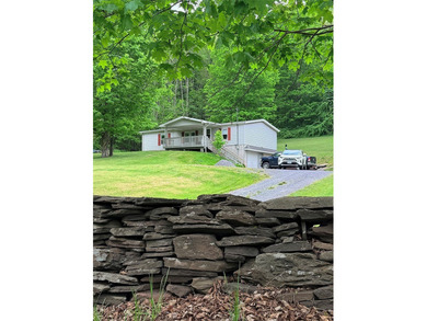 *****Welcome to this charming double-wide pre-manufactured home - photo 4