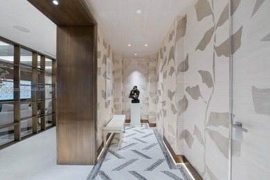 This elegantly designed 4-bedroom, 4.5-bath residence at Palazzo