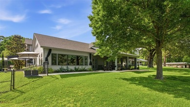 A serene 12 acres of lush pastureland and mature trees, this - photo 3