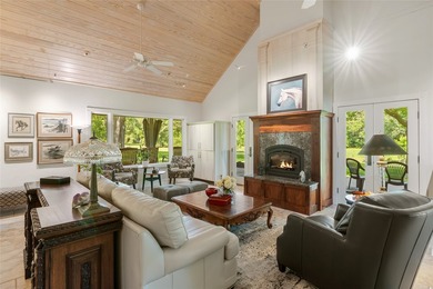 A serene 12 acres of lush pastureland and mature trees, this - photo 5