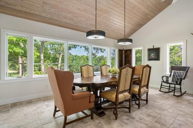 A serene 12 acres of lush pastureland and mature trees, this - photo 7
