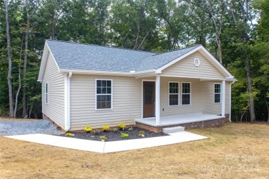 Adorable new construction property in a gated community on Lake - Lake Home For Sale in Mount Gilead, North Carolina