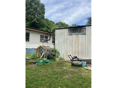 Tucked away on approximately 1 acre, this versatile manufactured - photo 12