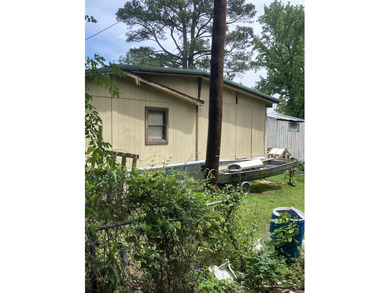 Tucked away on approximately 1 acre, this versatile manufactured - photo 15
