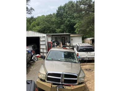 Tucked away on approximately 1 acre, this versatile manufactured - photo 17