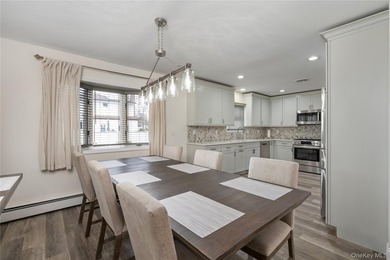 Welcome to this beautifully maintained center hall colonial - photo 9