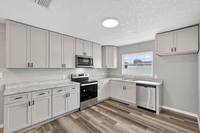 Discover timeless coastal elegance at 1027 Bel Aire Dr, a newly - photo 14