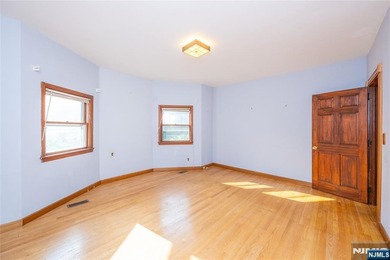 This income-producing two-family home lies in the heart of - photo 11