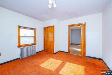 This income-producing two-family home lies in the heart of - photo 13