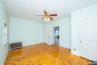 This income-producing two-family home lies in the heart of - photo 14
