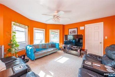 This income-producing two-family home lies in the heart of - photo 18